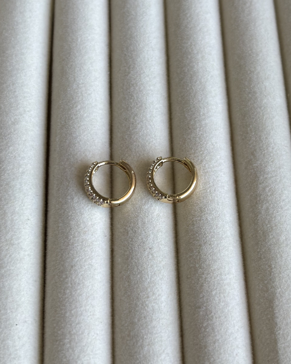 Producto - Argollas terminadas en brillantes de acero dorado 1.2cmd