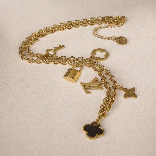 Producto - Collar estampa con varios dijes