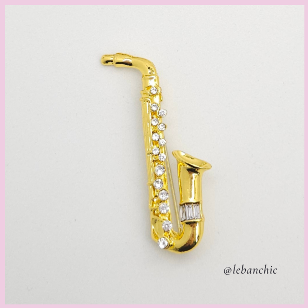 Producto - Prendedor Sax