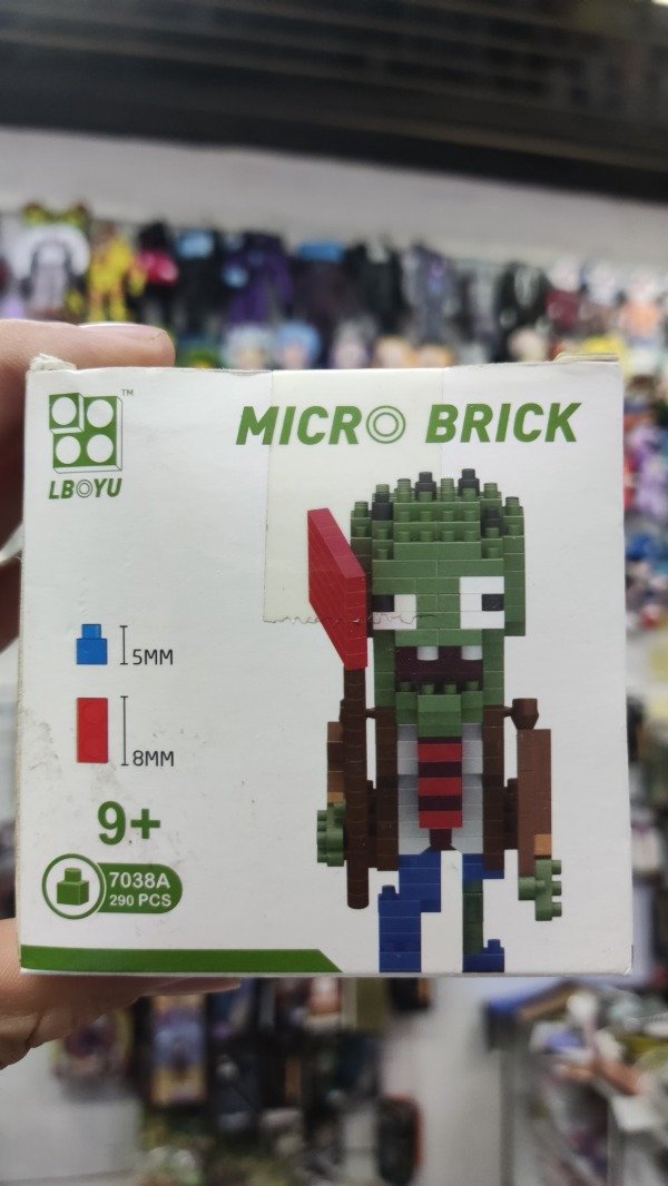 Producto - Rompecabezas Micro Bricks Lboyu Planta VS Zombie Abanderado 7038A