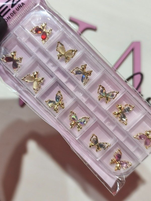 Producto - Dijes mariposa dorada