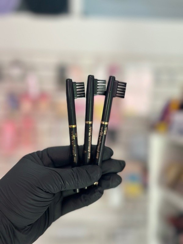 Producto - DELINEADOR RETRÁCTIL CON CEPILLO