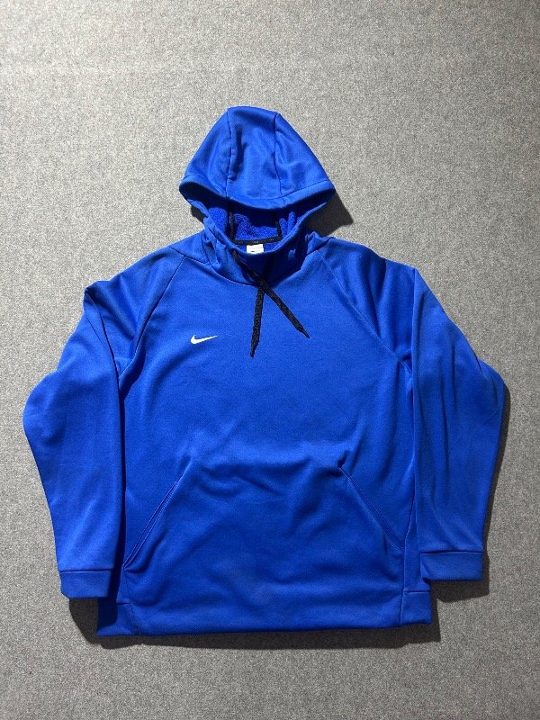 Producto - Buso canguro Nike  athetic, color azul. Talle XL