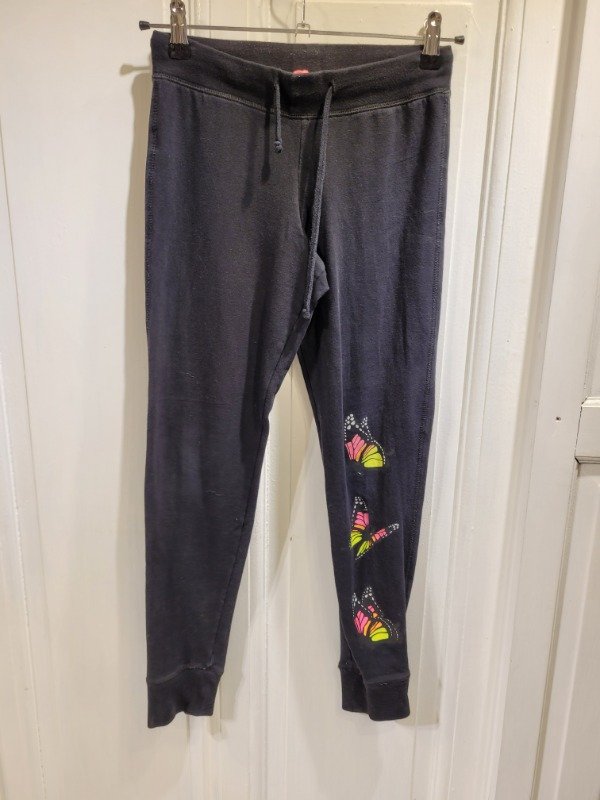 Producto - Jogging A+ negro con mariposa Talle 14 años - PRECIO: 16X