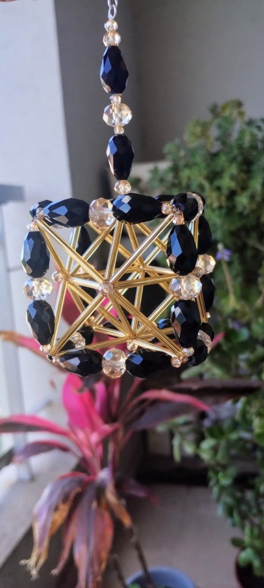 Producto - Metatron Negro/Dorado