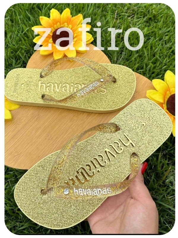 Producto - Ojota Havaiana Redonda Glitter Oro