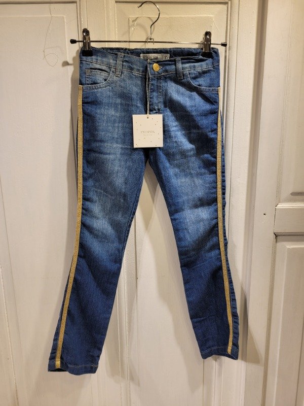 Producto - Jean PIOPPA azul con franjas doradas Nuevo c/etiq Talle 10 años - PRECIO: 24X