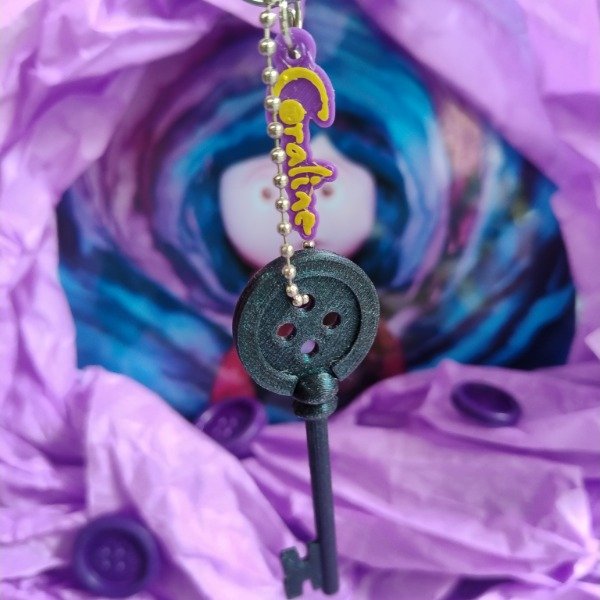 Producto - Llavero - Puerta Secreta Coraline