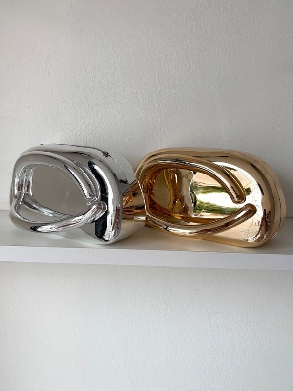 Producto - Clutch trendy metal