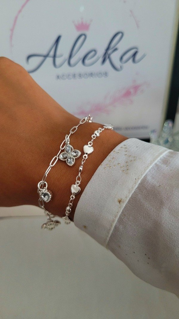 Producto - Pulsera doble cadena dijes flor y corazones de acero blanco