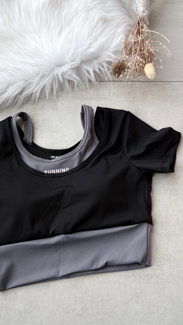 Top deportivo negro con gris talle M