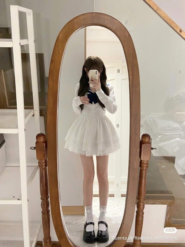 Producto - Vestido corto acampanado con moño azul