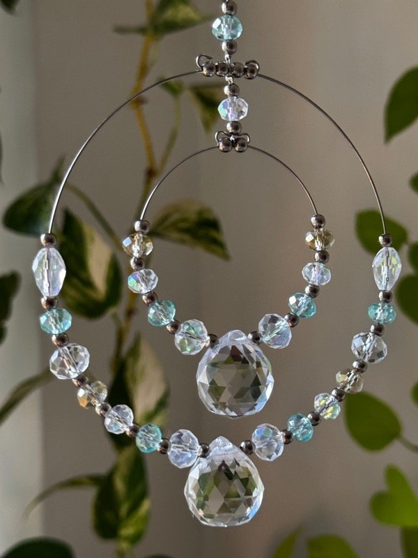 Producto - Doble aro, doble esfera de puro cristal
