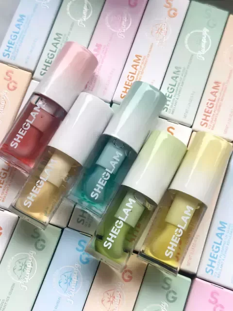 Producto - LIP GLOSS SHEGLAM APLICADOR GUESO EN CAJITA