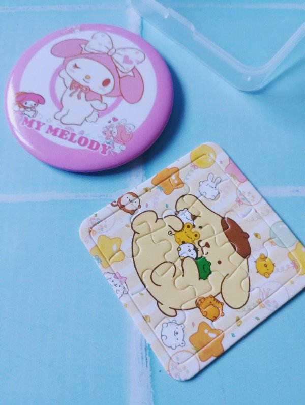 Producto - Pin + mini rompecabezas