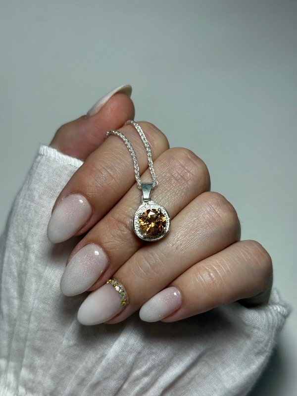 Producto - Dije piedra dorada circular - 1