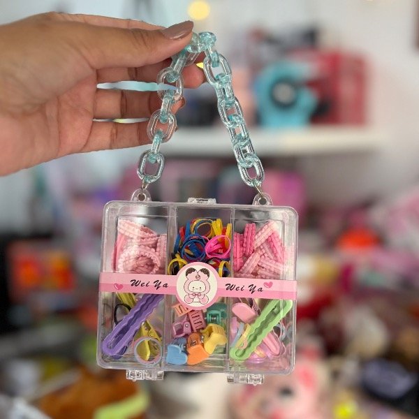 Producto - Colita de Pelo en Estuche con Cadena 7368