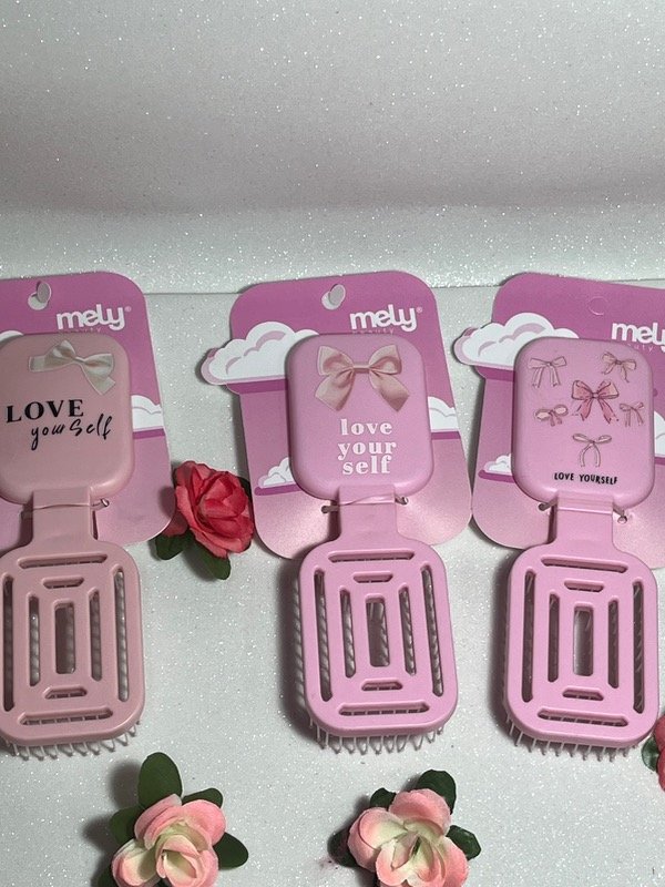 Producto - Cepillo con espejo de moño