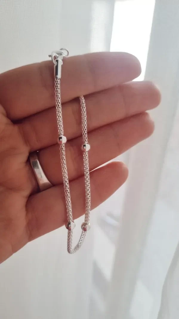 Producto - Pulserita tejida con bolitas Ab
