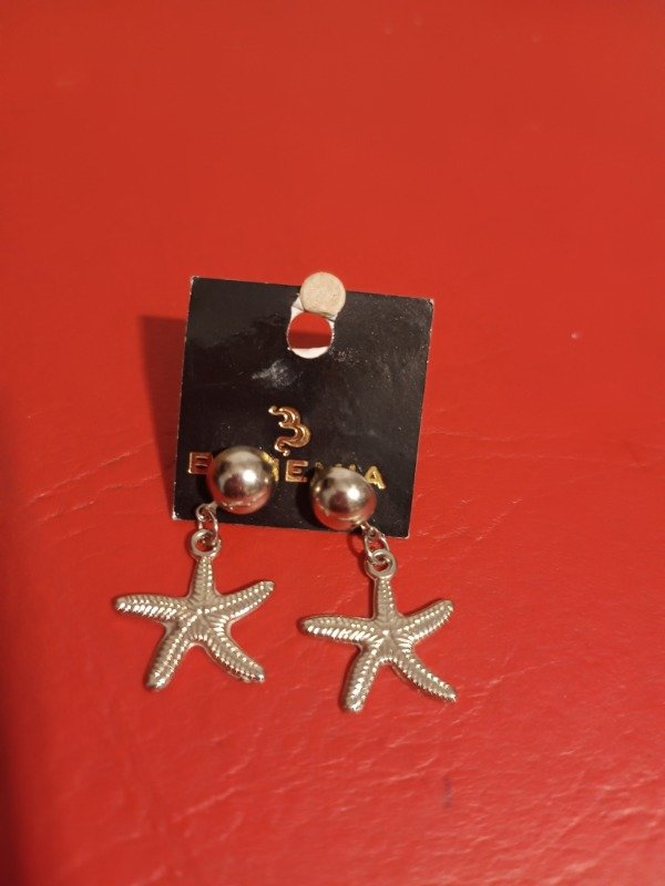 Producto - Aros plateados con dije