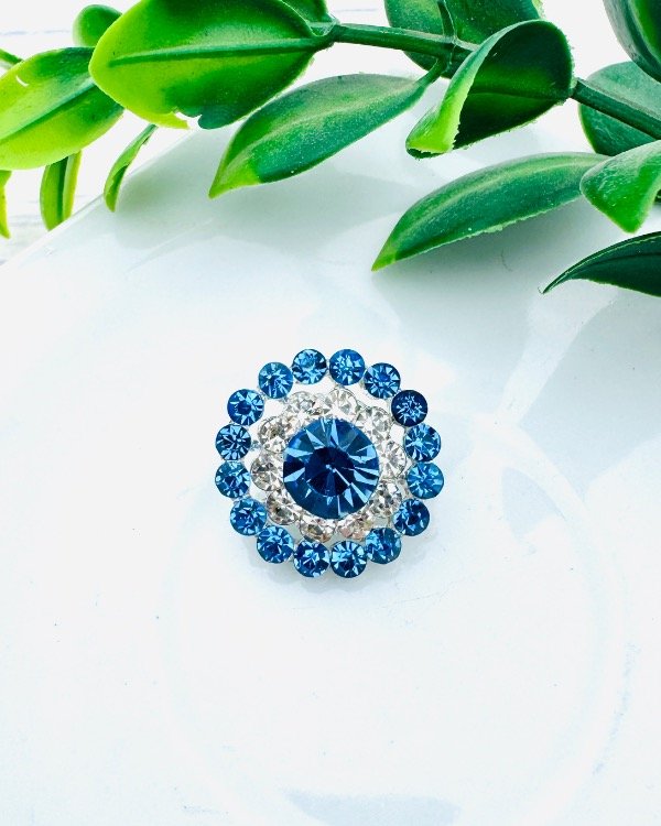 Producto - PRENDEDOR ESCARAPELA REDONDO STRASS