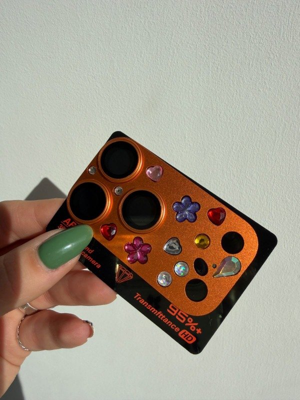 Producto - Vidrio templado de camara modulo completo strass 17 pro max orange