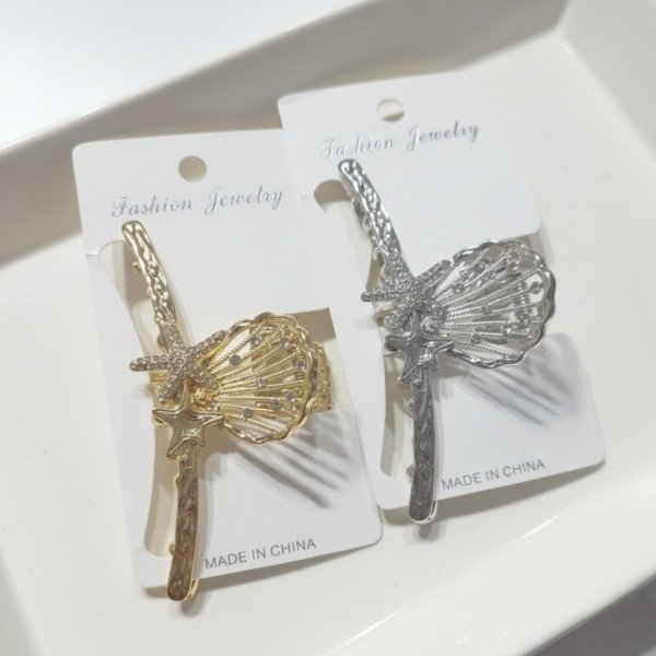 Producto - Broche metálico brillo Almeja de mar Dorado/Plateado