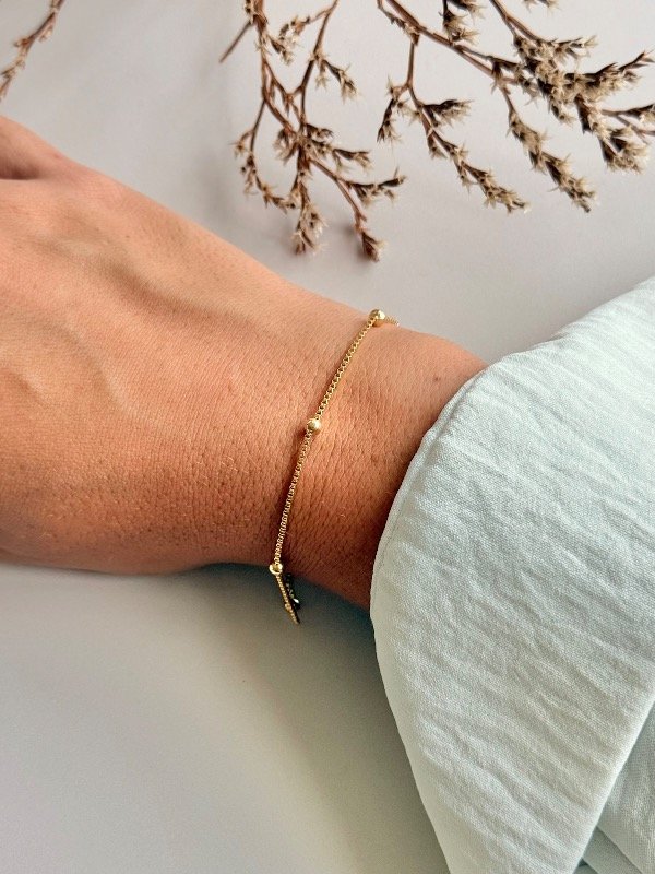 Producto - Pulsera dorada bolitas