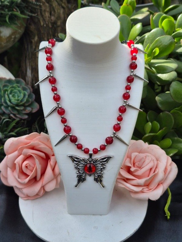 Producto - collar collar ojo de mariposa con puas col-omp