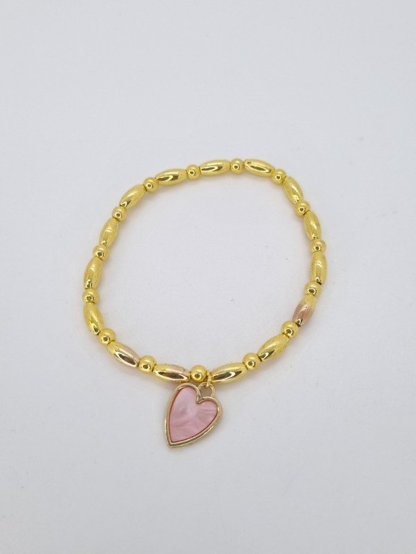 Producto - Pulsera elastizada acero dorado dije corazón nacar color