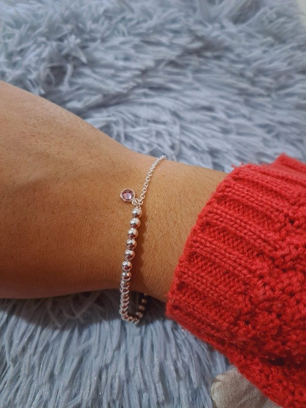 Producto - Tobillera de acero blanco pelotitas