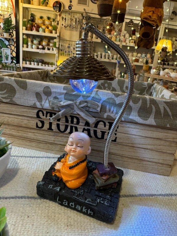 Producto - Buda naranja con lampara (Efectivo: 17.200)