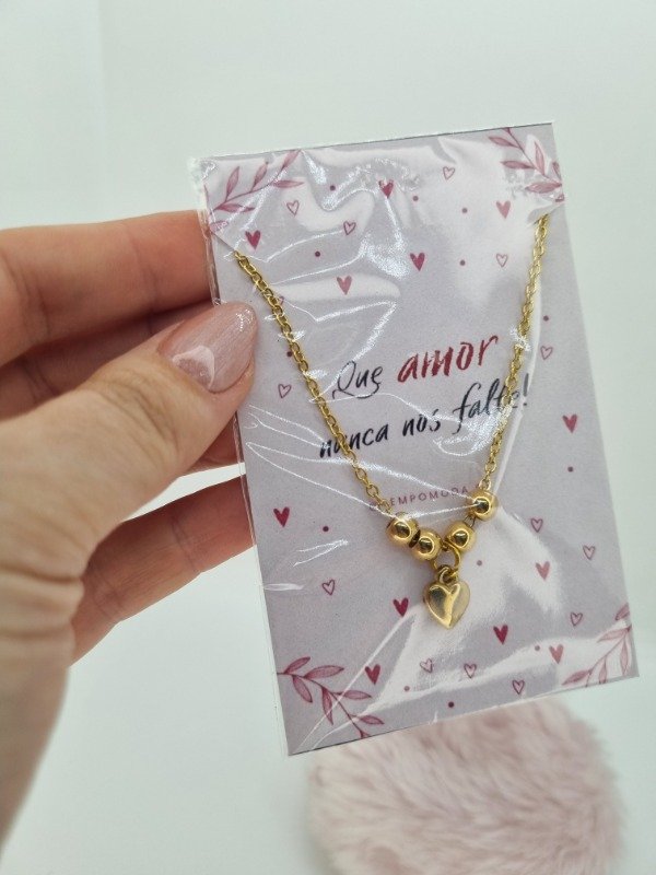 Producto - Tarjeta amor con cadena acero dorado pelotitas dije corazón