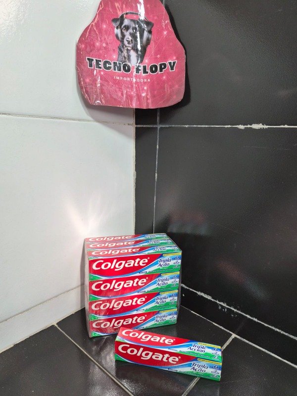 Producto - Pasta dientes colgante triple acción 90g