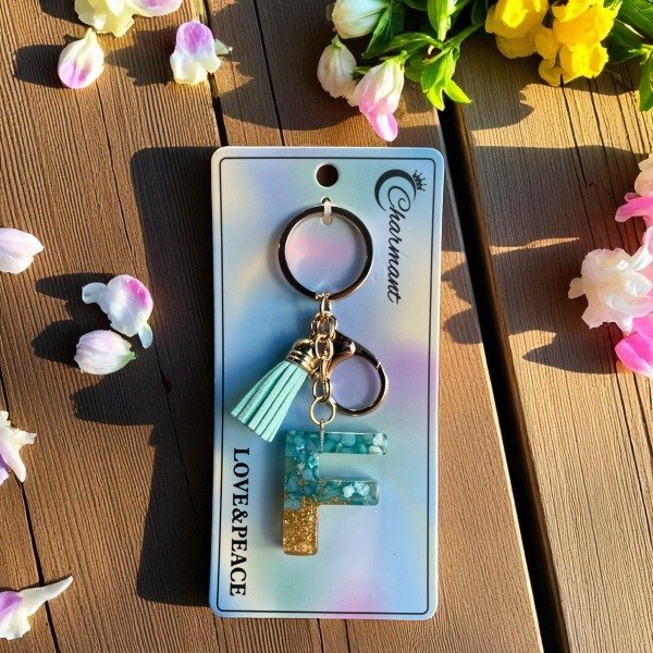 Producto - Llavero iniciales resina - Celeste  -  Letra  F