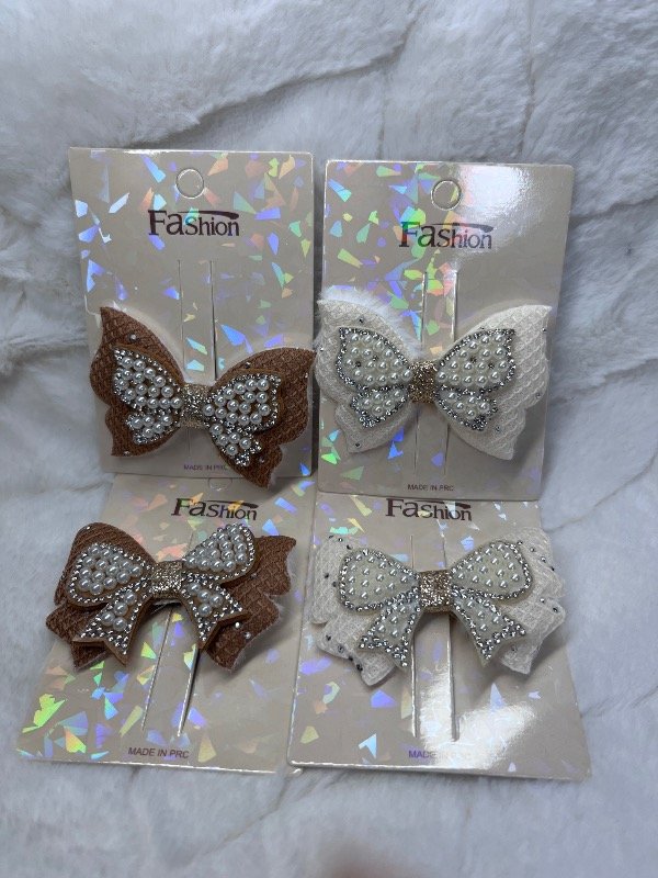 Producto - Pinza con moño perlas y strass
