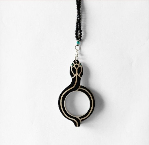 Producto - Lupa Flippan Serpiente negro hueso