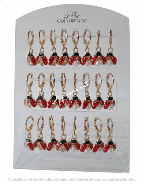 Producto - Aros vaquitas de san antonio doradas