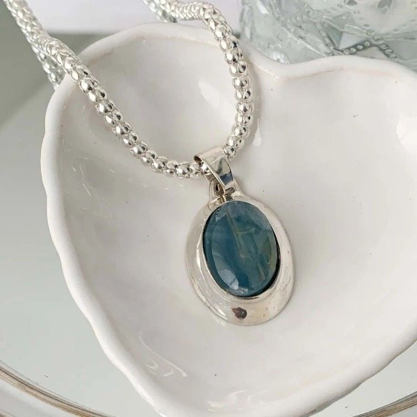 Producto - Dije ónix cielo oval