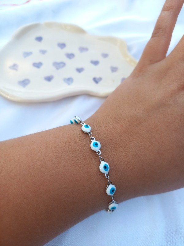 Producto - pulsera ojitos silver (blanco y celeste)