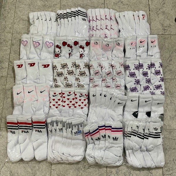 Producto - Docena surtida de tenis blancas