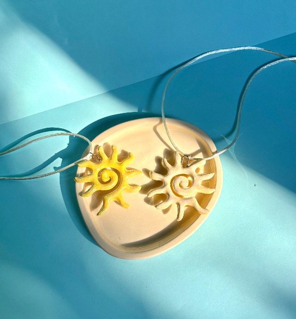 Producto - Sol Espiral BIFAS Natural y Amarillo Tornasol