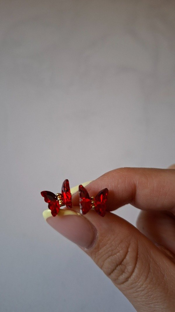 Producto - Aros de acero dorado mariposa roja