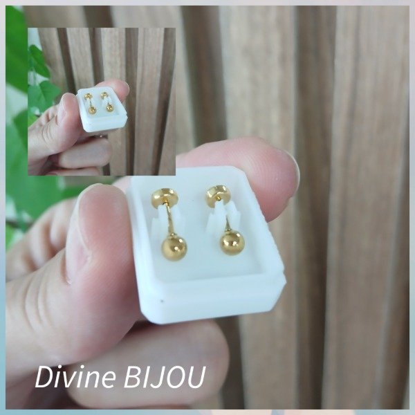 Producto - Abridores de acero dorado