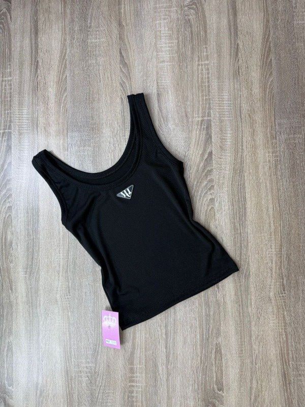 Producto - Musculosa met