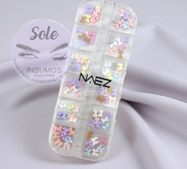 Producto - MOÑOS PARA DECORACION DE UÑA NAEZ (surtidos)