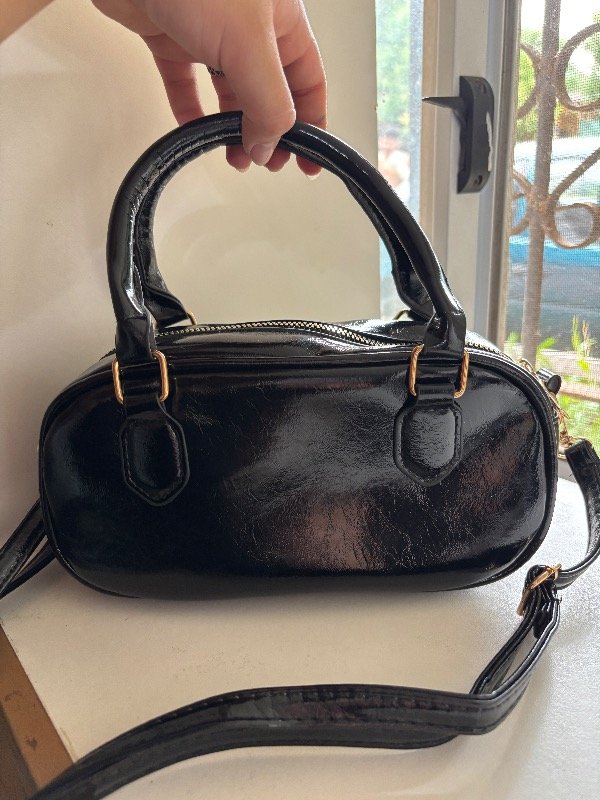 Producto - Cartera negra.1 viene con correa larga