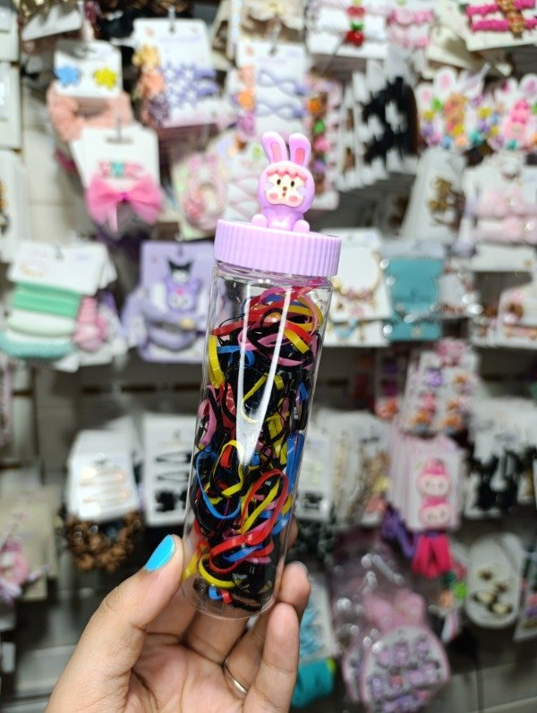 Producto - Tarrito con tapa conejo con gomitas para el pelo