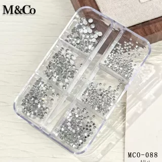Producto - STRASS CRISTALES TRANSPARENTE CON BASE DORADO EN CAJA MCO
