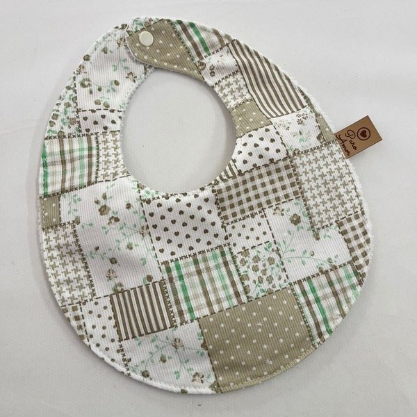 Producto - Babero impermeable miniflores beige